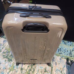 TUMI LUGGAGE FAIRLY & GENTLY USED TUMI CHECK IN 30" - SMALL CRACKED ON THE SIDE